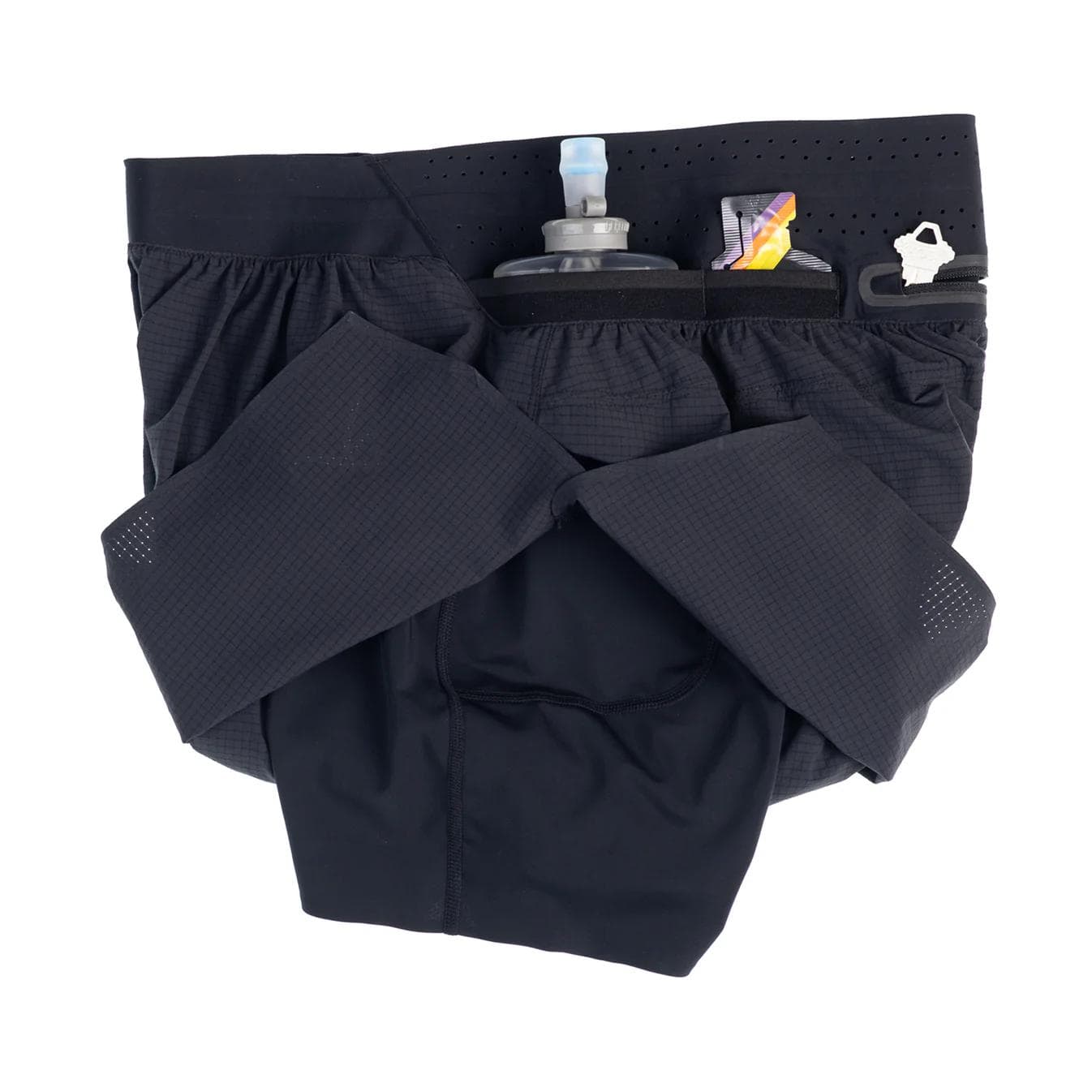 Dark gray running shorts with a water bottle, energy gel, and clip in the waistband pockets.